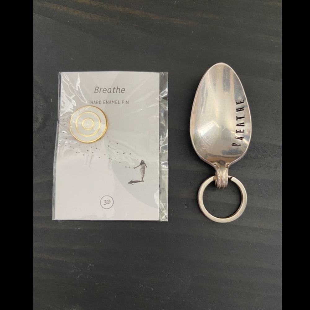 Breathe calming spoon keychain with hard enamel pin.